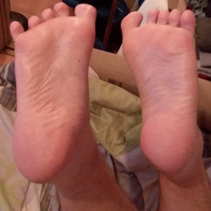 My soles here, after a decent amount of Coconut oil. I think it's amazing stuff! ^^