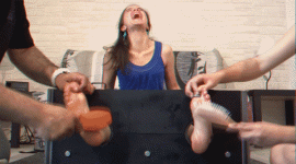 Evana in the Stocks GIF.gif