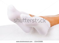 stock-photo-woman-wearing-socks-for-foot-care-isolated-on-white-background-131433506.jpg