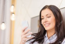 25849682-business-technology-internet-and-hotel-concept-happy-businesswoman-with-smartphone-lyin.jpg