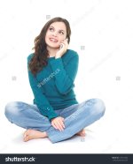 stock-photo-happy-young-woman-in-a-blue-shirt-and-blue-jeans-sitting-on-the-floor-woman-talking-.jpg