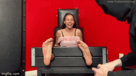 Brooklyn Tickled in the Stocks - GIF.gif