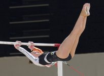 800px-Sanne_Wevers_on_uneven_bars.jpg