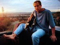 Woody Harrelson guitar and sole in car.jpg