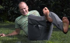 Woody Harrelson soles on grass.jpg