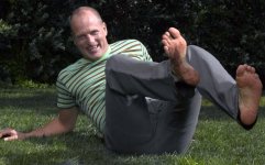 Woody Harrelson soles on grass.jpg