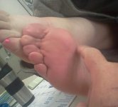 mary_s_feet_tickled_on_desk_v_by_osco89-d64slo8.jpg