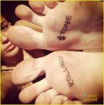 miley-cyrus-rolling-stone-tattoo-on-feet-01.jpg