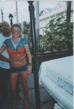 tickling and squeezing girl in belly shirt.jpg