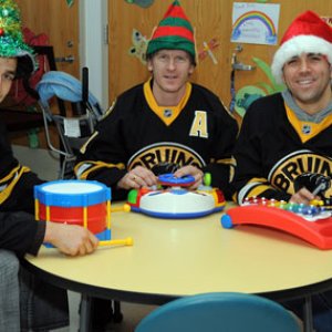 Patrice Bergeron P.J. Axelson & Manny Fernandez