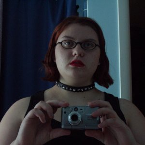 me modeling my first spiked collar, and no I got it at the pet store...