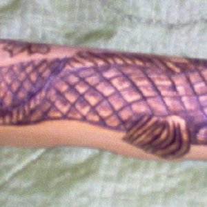 Hand Guard - Chinese SKS - Koi - Lotus Blossoms

On this SKS, the man who commissioned me to do it said to load it up with Chinese art, symbols and an