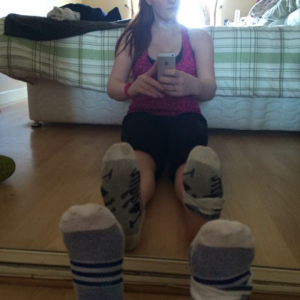 one sock on one sock half on