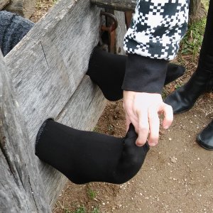 Toes tickling in the stocks