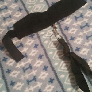 Leather cuffs; part of an under-the-bed restraint system.