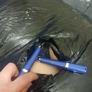 Made a hole in the wrap to get her inner thighs