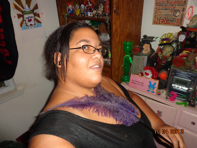 Better view of my double feather...and my dresser! Lol!