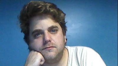 Few months ago sitting in my roommate's bedroom.  I was going for the 'Thinker' look.  I was hoping to have a dreamy expression but it looks like I'm 