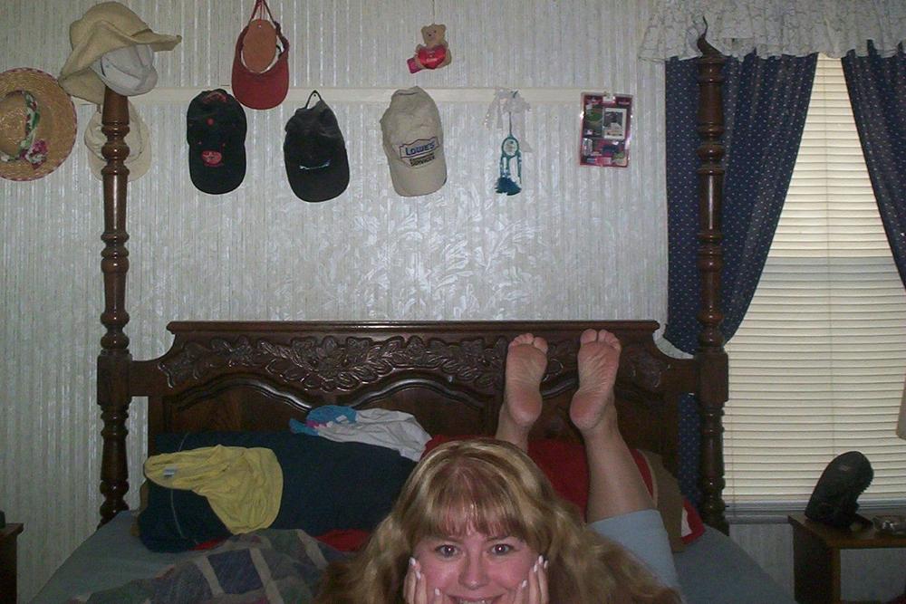just chillin on the bed with my ticklish feet showing hehe