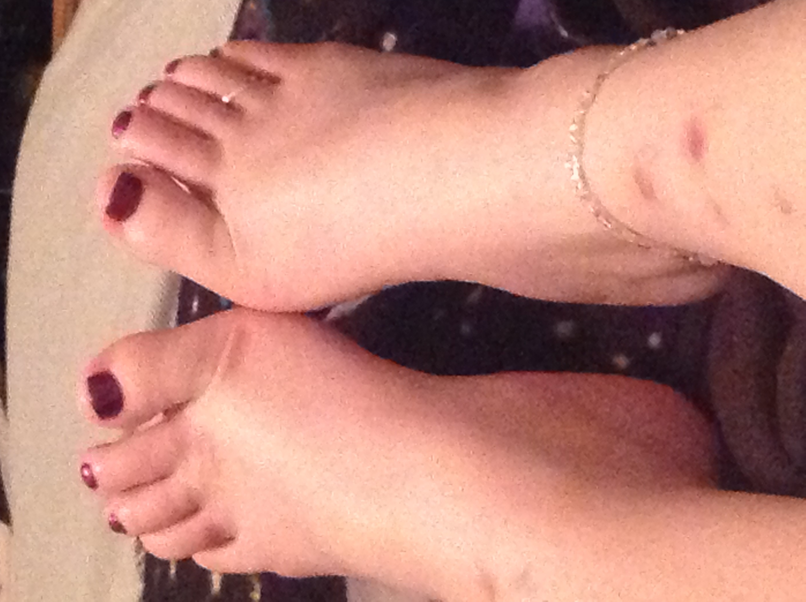 My feet with purple polish, toe ring and anklet