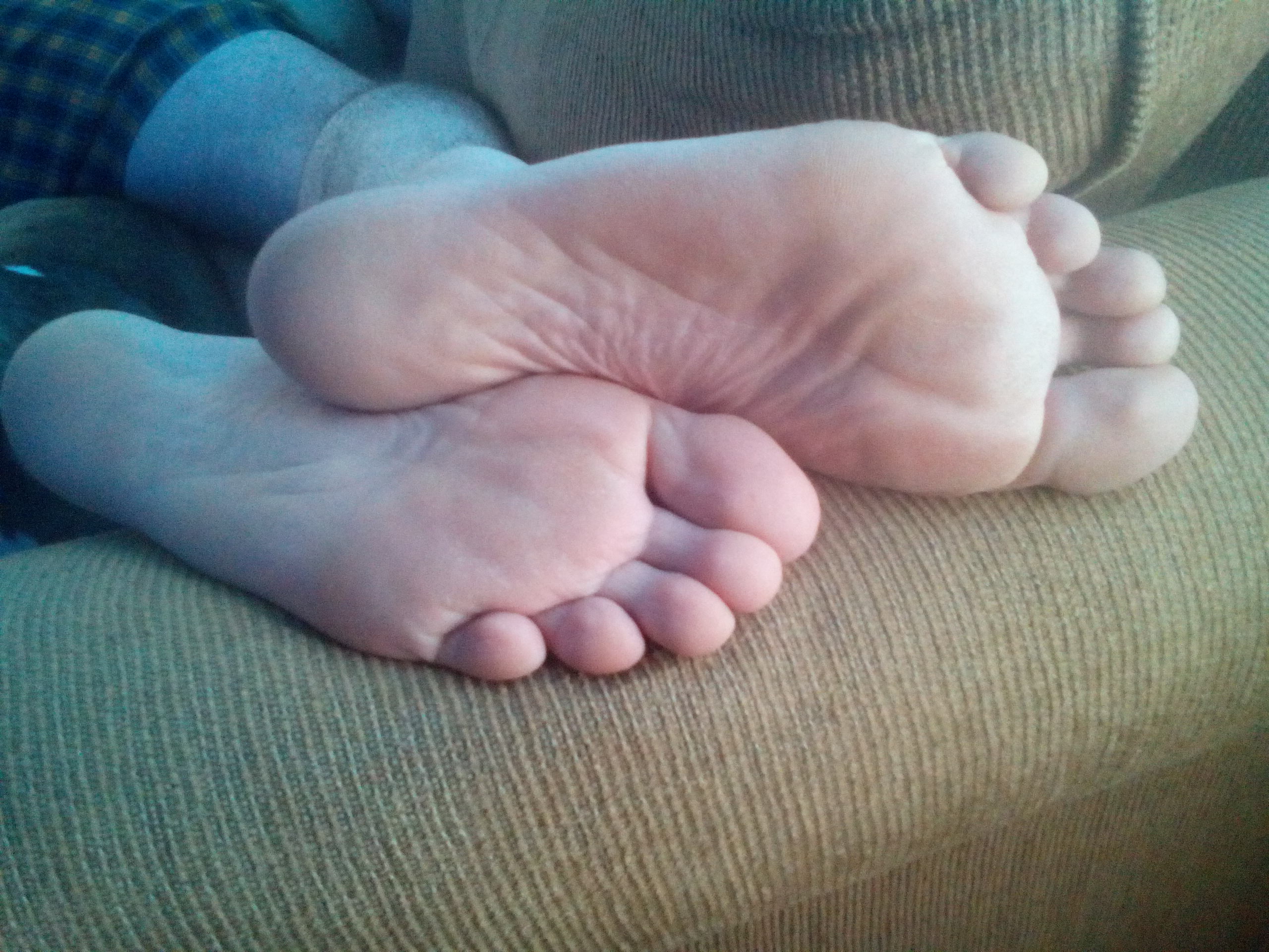 My husband's sexy feet that he won't let me tickle!!