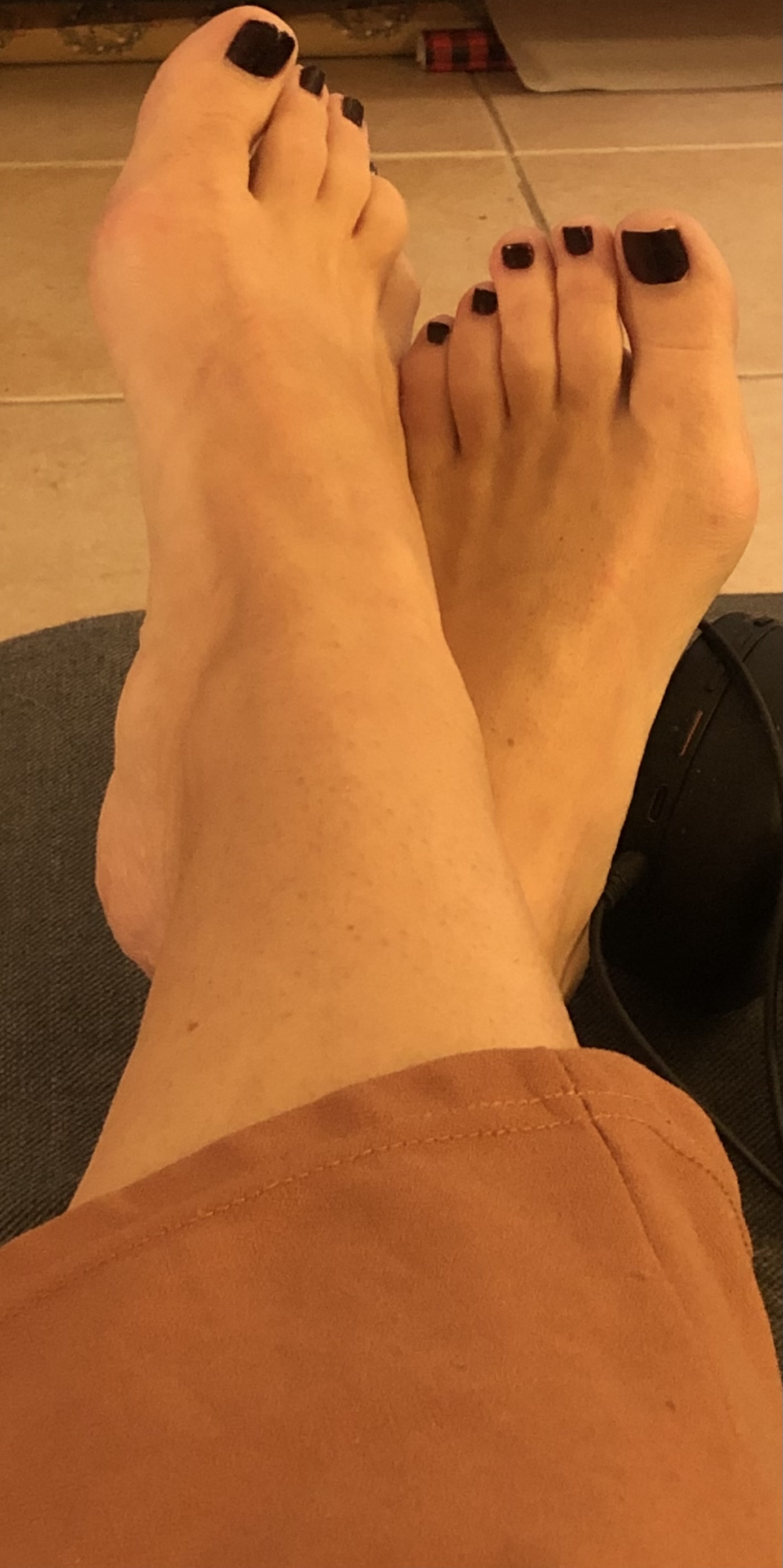 Relaxing while she waits for me to get home. Nothing better to come home to than her asking me to rub her feet.