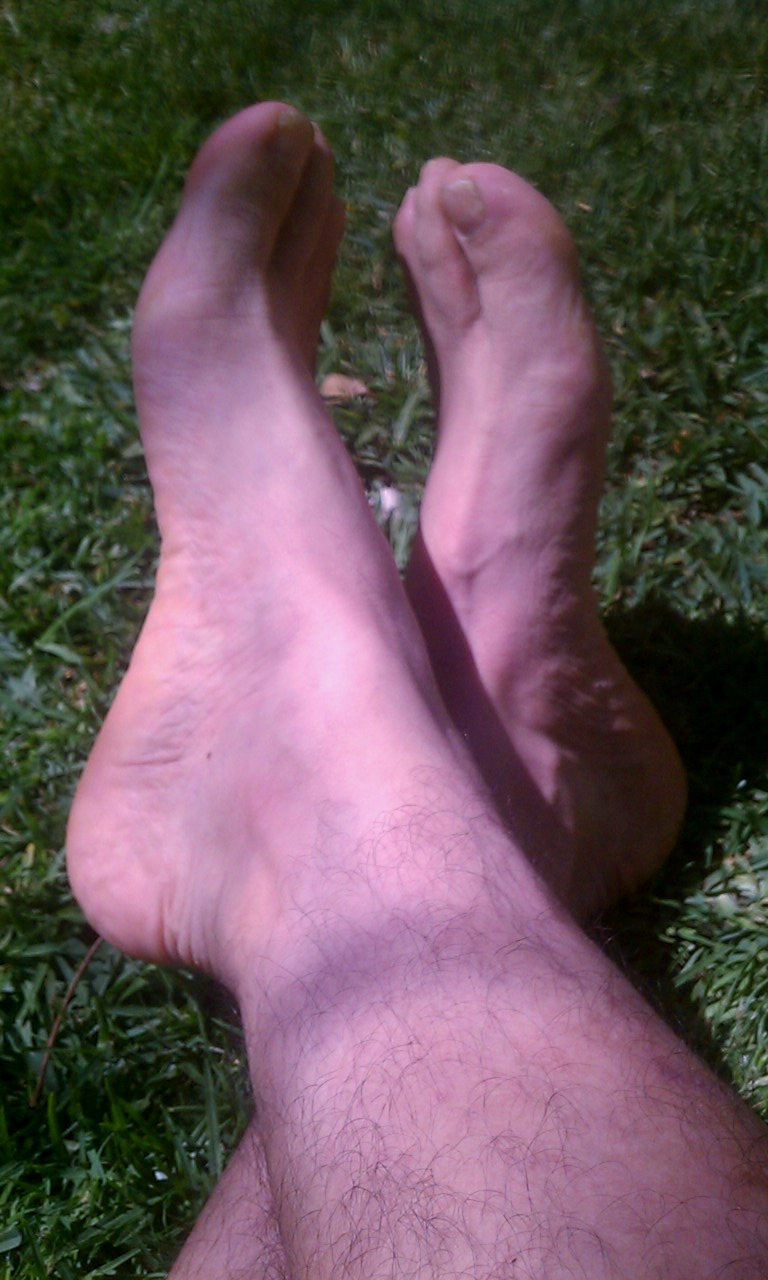 Ticklish Bare feet in the grass